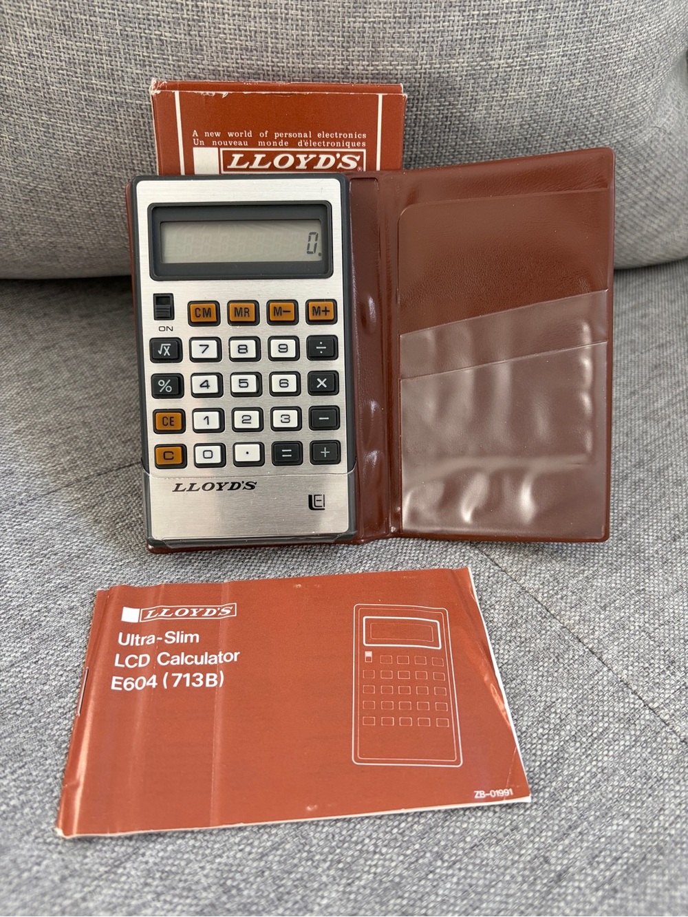 Vintage LLOYD'S Ultra-Slim LCD Calculator in Brown and Silver